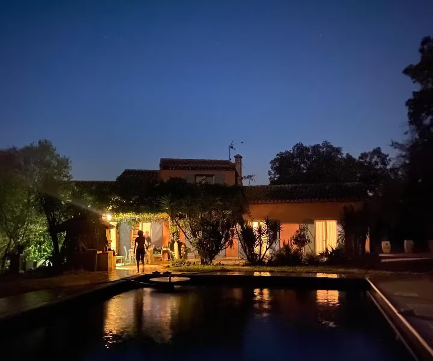 Maison Tropez villa at dusk